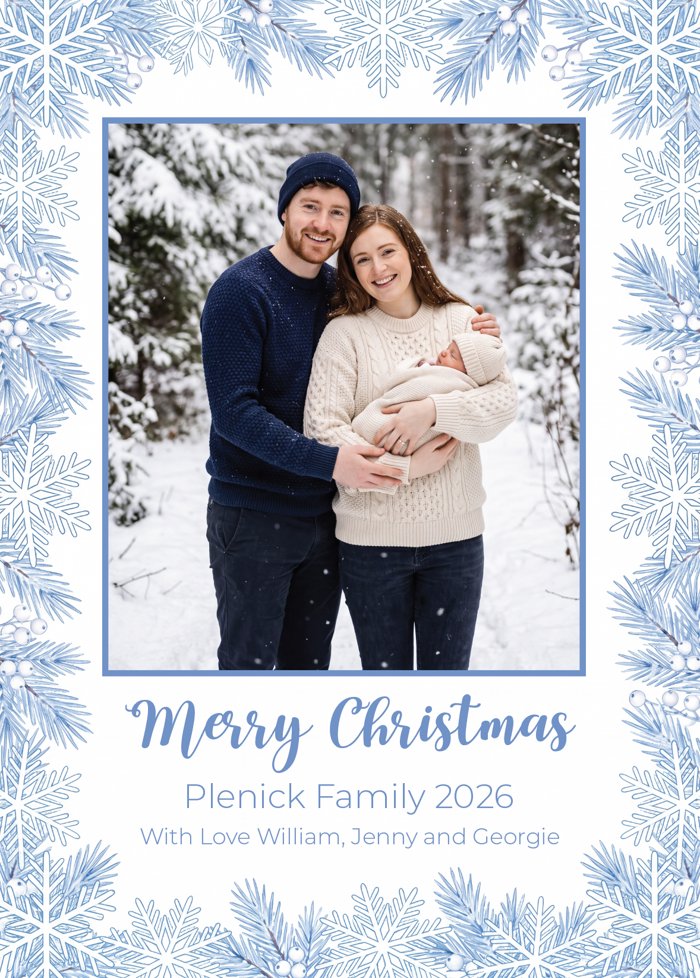 Sample Winter Wonderland card with a family photo framed by blue snowflakes and frosted pine